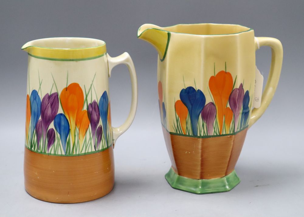 Two Clarice Cliff crocus pattern jugs, tallest 20cm